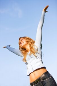 bigstockphoto_Woman_Full_Of_Success_4026014